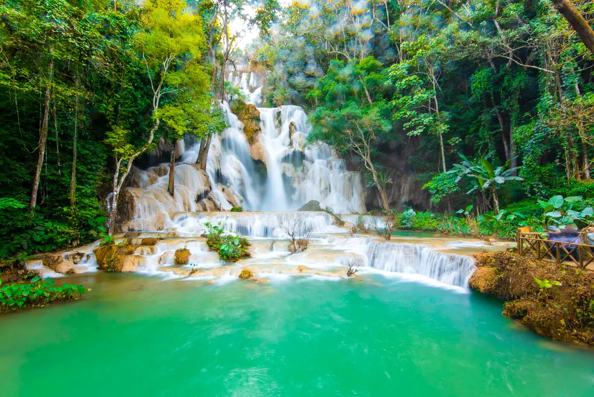 Kuang Si Waterfalls — turquoise pools in lush jungle