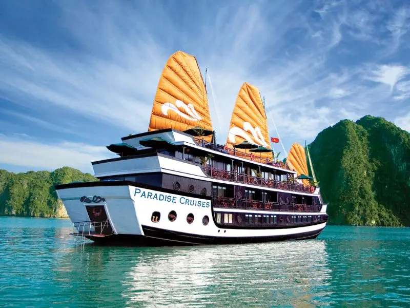Paradise Cruise vessel cruising the emerald waters of Halong Bay